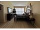 Spacious bedroom with large windows, dresser and a king-size bed at 6462 Cantua Ln # 105, Orlando, FL 32835