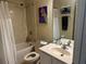 Bathroom with tub, shower, toilet, and vanity at 6462 Cantua Ln # 105, Orlando, FL 32835