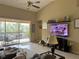 Bright living room with access to balcony and scenic views at 6462 Cantua Ln # 105, Orlando, FL 32835