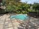 Relaxing community hot tub with surrounding landscaping at 6462 Cantua Ln # 105, Orlando, FL 32835