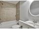 Clean bathroom with tile flooring, a bathtub, and a vanity at 1053 E Hancock Dr, Deltona, FL 32725