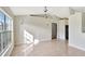 Bright living room with tile floors and vaulted ceiling at 1053 E Hancock Dr, Deltona, FL 32725