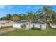 House with solar panels and a spacious lawn at 1053 E Hancock Dr, Deltona, FL 32725