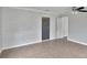 Spacious bedroom with tile floors and a chalkboard accent wall at 1053 E Hancock Dr, Deltona, FL 32725