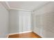 Empty spare bedroom with wood floors and neutral walls, awaiting your design at 1053 E Hancock Dr, Deltona, FL 32725