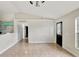 Bright living room with tile floors and access to kitchen at 1053 E Hancock Dr, Deltona, FL 32725