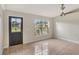 Spacious living area with tile floors and large windows at 1053 E Hancock Dr, Deltona, FL 32725
