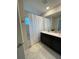 Bathroom with shower/tub combo and double vanity at 1144 Challenge Dr, Davenport, FL 33896