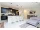 Open kitchen with island and modern appliances at 1144 Challenge Dr, Davenport, FL 33896