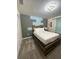 Bedroom with gray carpet and a full-size bed at 1144 Challenge Dr, Davenport, FL 33896