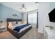 Primary bedroom with king-size bed and TV at 1812 Tropical Palms Cir, Kissimmee, FL 34747