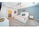 Spacious bedroom with a king-size bed and ensuite bathroom at 1812 Tropical Palms Cir, Kissimmee, FL 34747