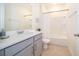 Clean bathroom with single vanity and bathtub at 1812 Tropical Palms Cir, Kissimmee, FL 34747