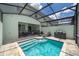 Private screened pool with patio and lounge chairs at 1812 Tropical Palms Cir, Kissimmee, FL 34747