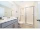 Bathroom with shower and single vanity at 1812 Tropical Palms Cir, Kissimmee, FL 34747