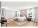Main bedroom with king-size bed and stylish decor at 2094 Derwent Dr, Davenport, FL 33896