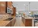 Modern kitchen with granite countertops and stainless steel appliances at 2760 Rialto Ct, Kissimmee, FL 34746