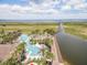 Resort-style pool, boardwalk and large lake view at 2760 Rialto Ct, Kissimmee, FL 34746