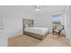 Cozy bedroom with a comfortable bed and rocking chair at 2760 Rialto Ct, Kissimmee, FL 34746