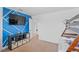 Fun bedroom with a blue accent wall and plenty of storage at 2760 Rialto Ct, Kissimmee, FL 34746