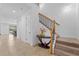 Bright and spacious entryway with tile floors and a staircase at 2760 Rialto Ct, Kissimmee, FL 34746
