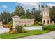 Gated community entrance with attractive landscaping at 2760 Rialto Ct, Kissimmee, FL 34746