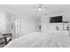 Spacious main bedroom with a large bed and access to other rooms at 2760 Rialto Ct, Kissimmee, FL 34746