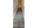 Carpeted staircase with white railing leading to the upper level at 3245 Sustainable Way, Kissimmee, FL 34747