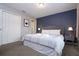 King size bed, nightstands with lamps, and a double door closet at 4410 Le Reve Ct, Kissimmee, FL 34746