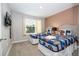Two twin beds with themed bedding, a TV, and window with blinds at 4410 Le Reve Ct, Kissimmee, FL 34746