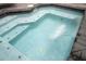 Close-up view of spa's waterfall feature at 4410 Le Reve Ct, Kissimmee, FL 34746