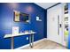 Modern entryway with console table and elegant mirror at 4410 Le Reve Ct, Kissimmee, FL 34746