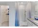 Bathroom with shower, linen closet and granite countertop at 5104 Tana Ter, Saint Cloud, FL 34773