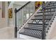 Close-up view of a black and white patterned staircase at 8460 Karwick St, Orlando, FL 32836