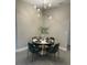 Elegant dining area with round table and modern chairs at 1554 Outback W Rd, St Cloud, FL 34771