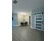Dining area with round table, chairs and barn door at 1554 Outback W Rd, St Cloud, FL 34771