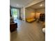 Open concept living area with stylish decor and entryway view at 1554 Outback W Rd, St Cloud, FL 34771