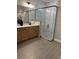 Spa-like bathroom with walk-in shower and double vanity at 1554 Outback W Rd, St Cloud, FL 34771