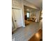 Open living room with stylish mustard-colored sofa and neutral decor at 1554 Outback W Rd, St Cloud, FL 34771