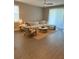 Spacious living room with sectional sofa and large TV at 1554 Outback W Rd, St Cloud, FL 34771