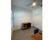 Home office with wood desk, mid-century modern credenza, and plantation shutters at 1554 Outback W Rd, Saint Cloud, FL 34771