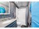 Bathroom with tub, shower, and ocean-themed decor at 2734 Oxymoron Way, Kissimmee, FL 34746