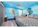 Bedroom with two twin beds and ocean-themed decor at 2734 Oxymoron Way, Kissimmee, FL 34746