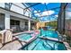 Inviting pool and spa area with screened enclosure, perfect for relaxation at 2734 Oxymoron Way, Kissimmee, FL 34746