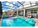Inviting pool and spa area with screened enclosure, perfect for relaxation at 2734 Oxymoron Way, Kissimmee, FL 34746