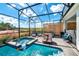 Inviting pool and spa area with screened enclosure, perfect for relaxation at 2734 Oxymoron Way, Kissimmee, FL 34746