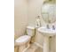 Clean and functional half bathroom with pedestal sink at 3011 White Orchid Rd, Kissimmee, FL 34747