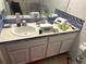 Bathroom vanity with a single sink and updated countertop at 345 Reserve Dr, Davenport, FL 33896