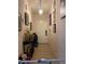 Entryway with tile flooring, chandelier, and storage space at 345 Reserve Dr, Davenport, FL 33896