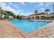 Community pool with a large deck and plenty of seating at 3510 Westerham Dr, Clermont, FL 34711